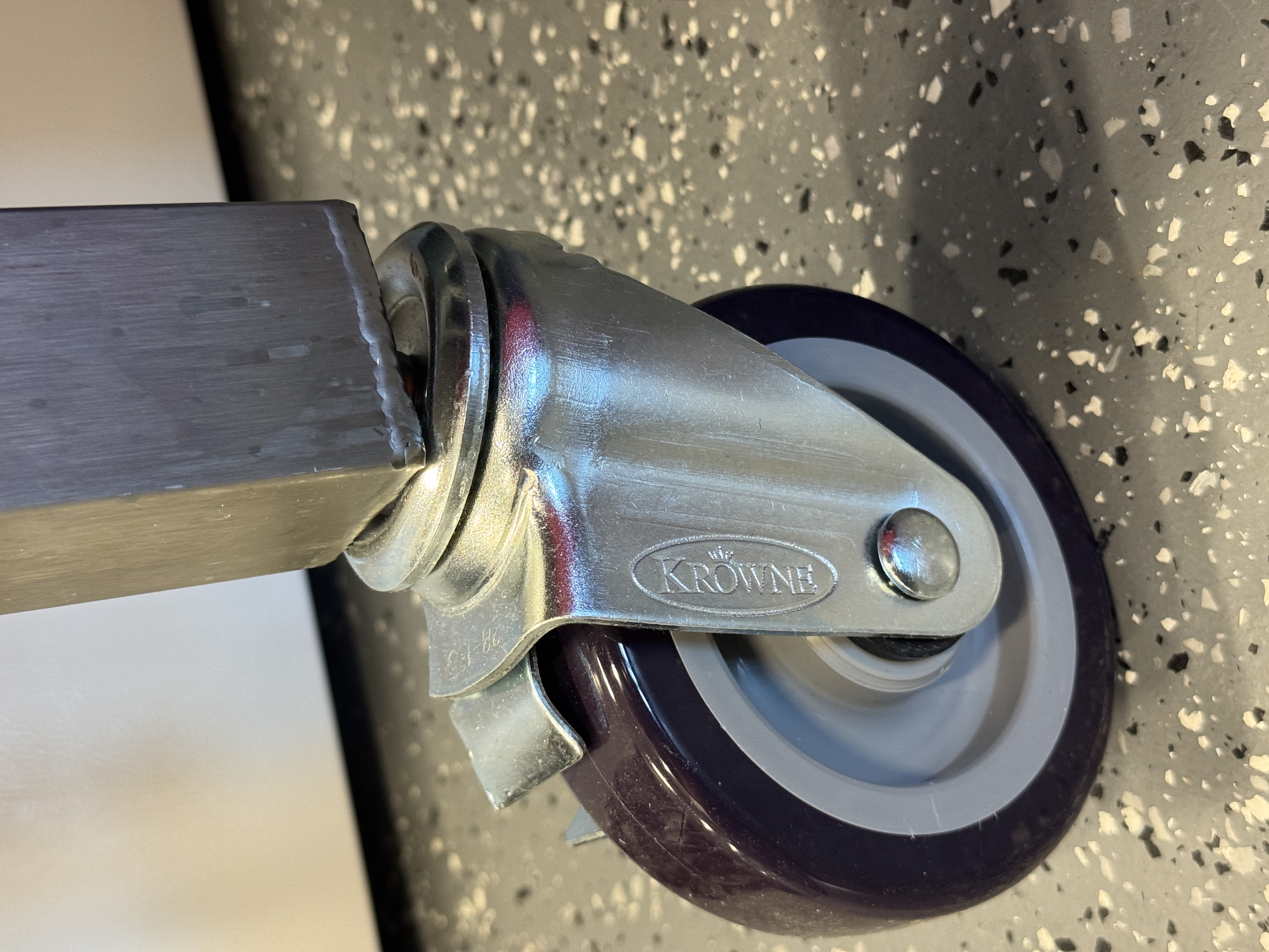 A caster attached to the bottom of the BSC, bent and sad