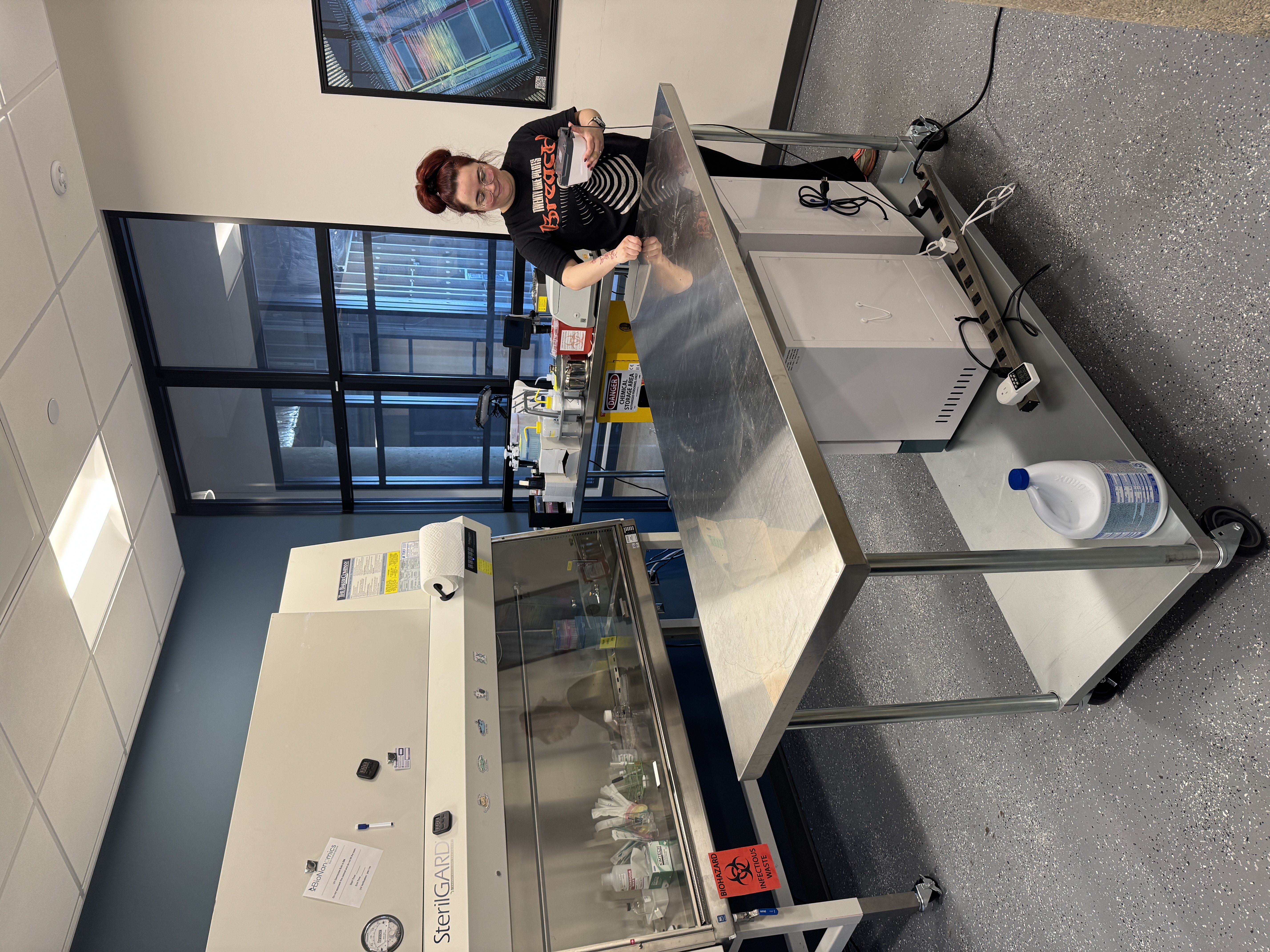 An image of us moving one of our lab tables out of the lab