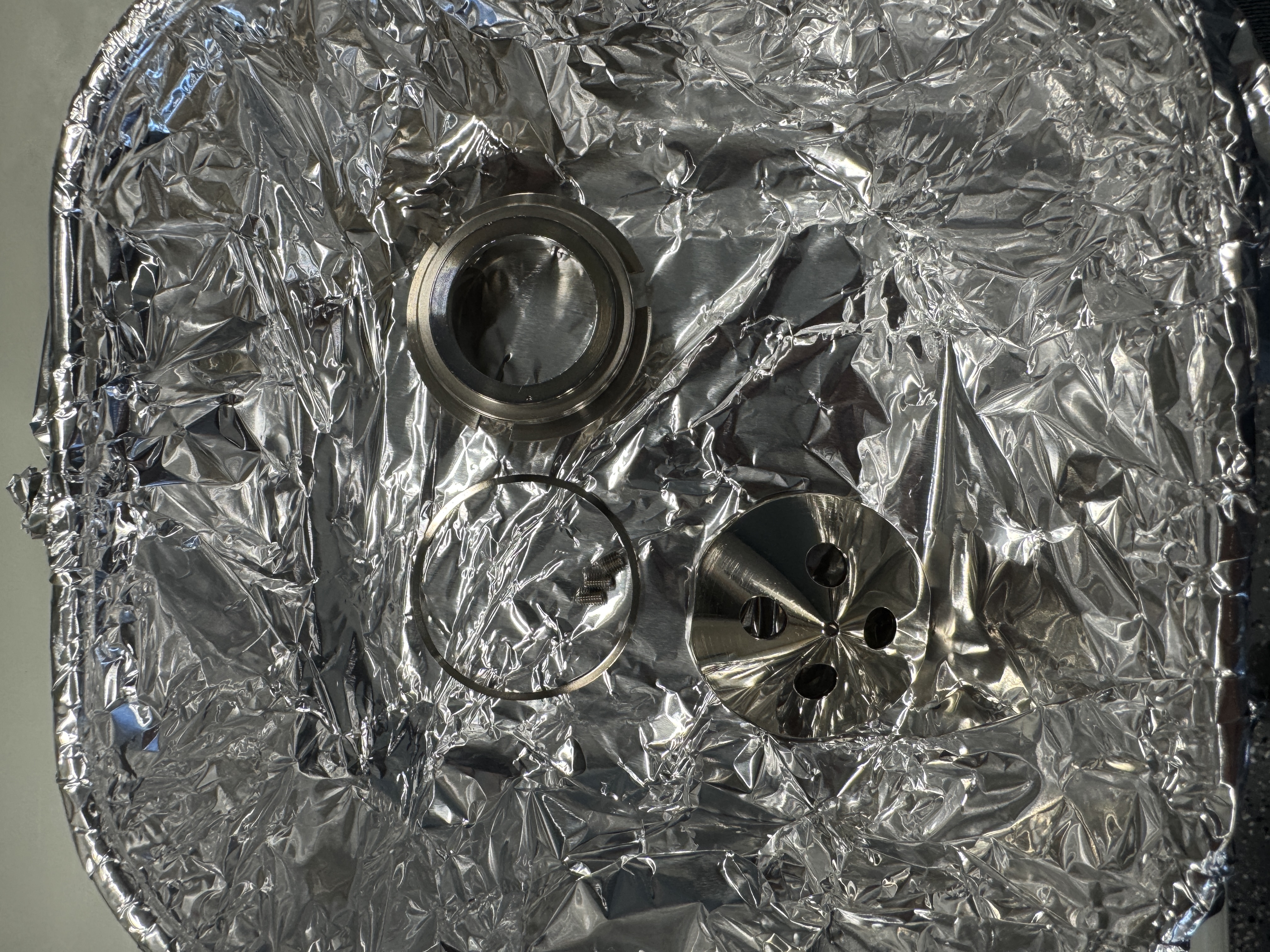 a small tub of components from the Wehnelt