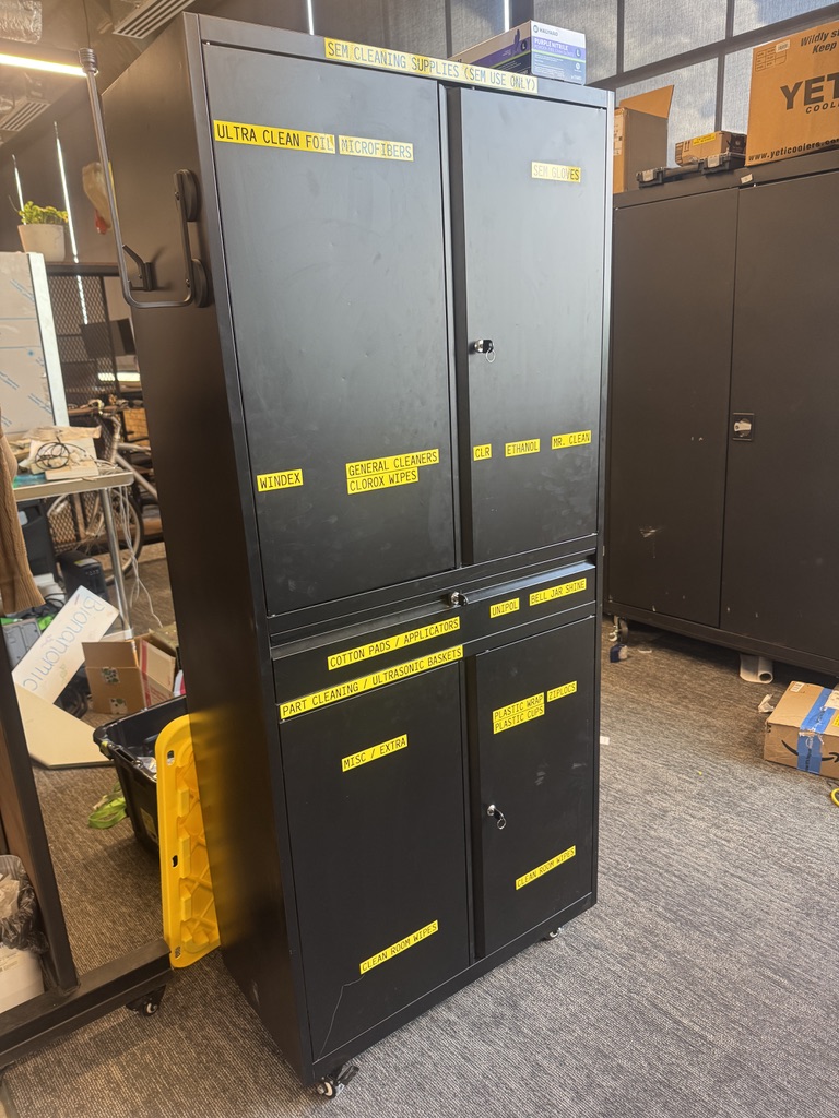 Putting some fresh labels on our cabinets