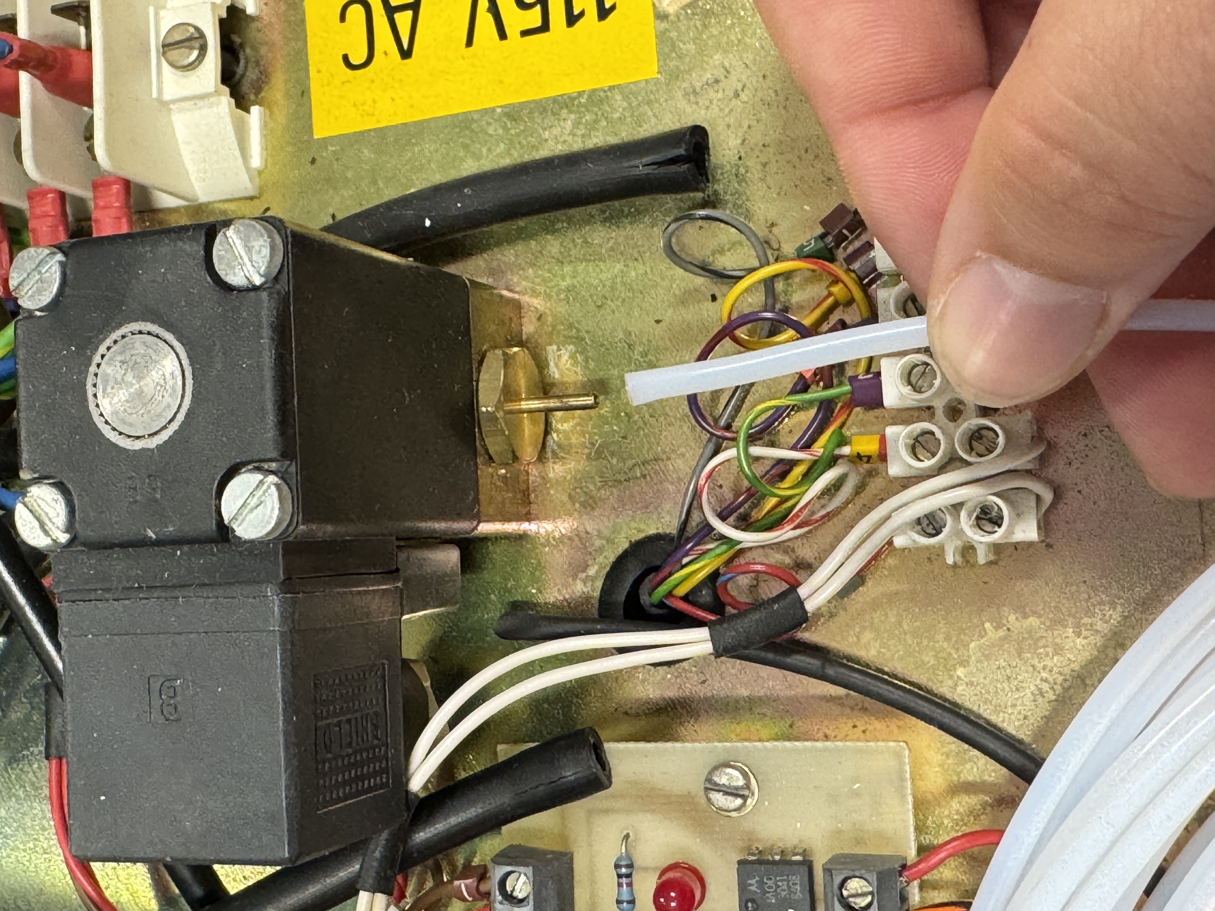 The smaller PTFE tubing test fit, without heat, it did not stretch around the barb.